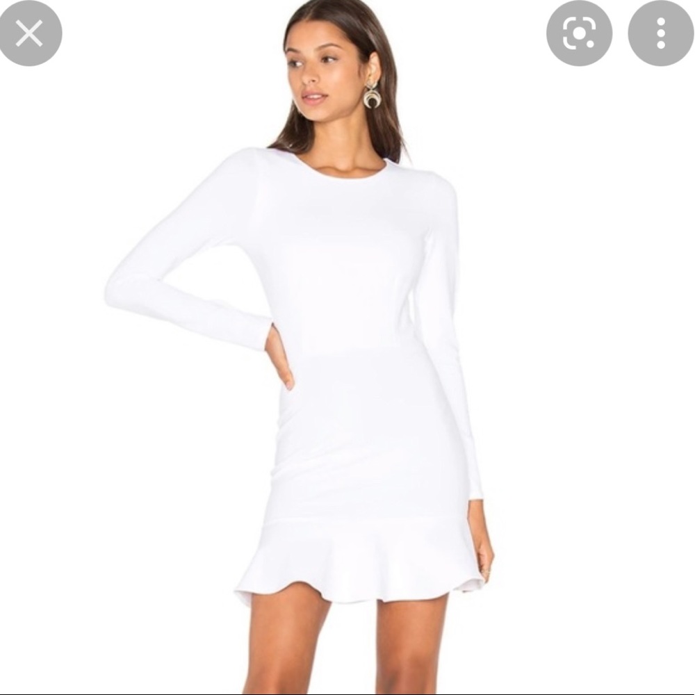 Donna Lozano white ruffle/peplum dress